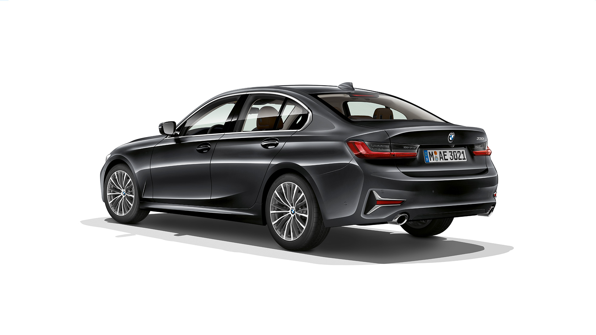 BMW 3-serie Sedan Luxury Line, bakparti. Bild snett bakifrån av bakpartiet hos BMW 3-serie Sedan i utförandet Luxury Line.