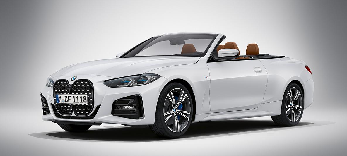BMW Individual Briljantvit metallic BMW 4-serie Cabriolet G23 2020 BMW 4-serie Cabriolet Briljantvit metallic G23 2020 sedd snett framifrån parkerad
