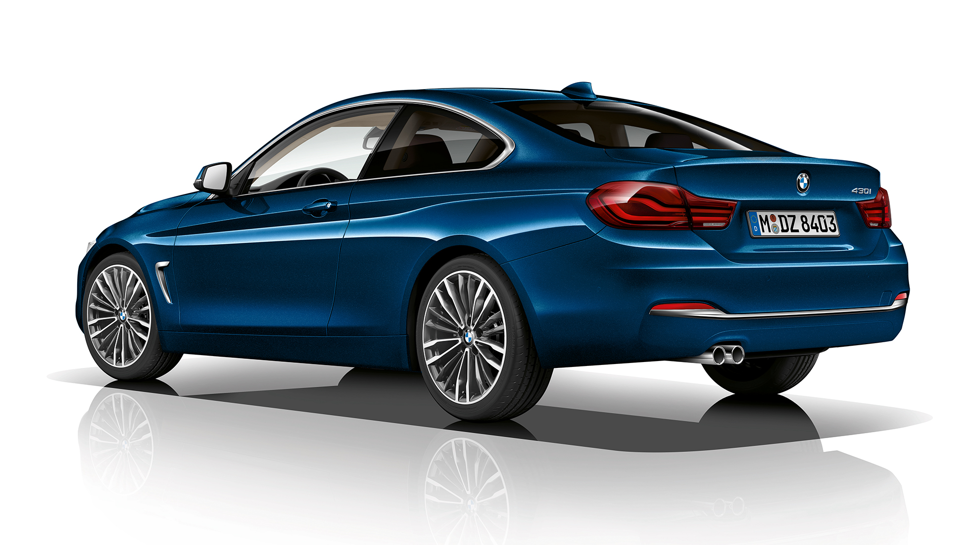 BMW 4-serie Coupé, Modell Luxury Line trefjärdedels vy bakifrån BMW 4-serie Coupé, Modell Luxury Line trefjärdedels vy bakifrån