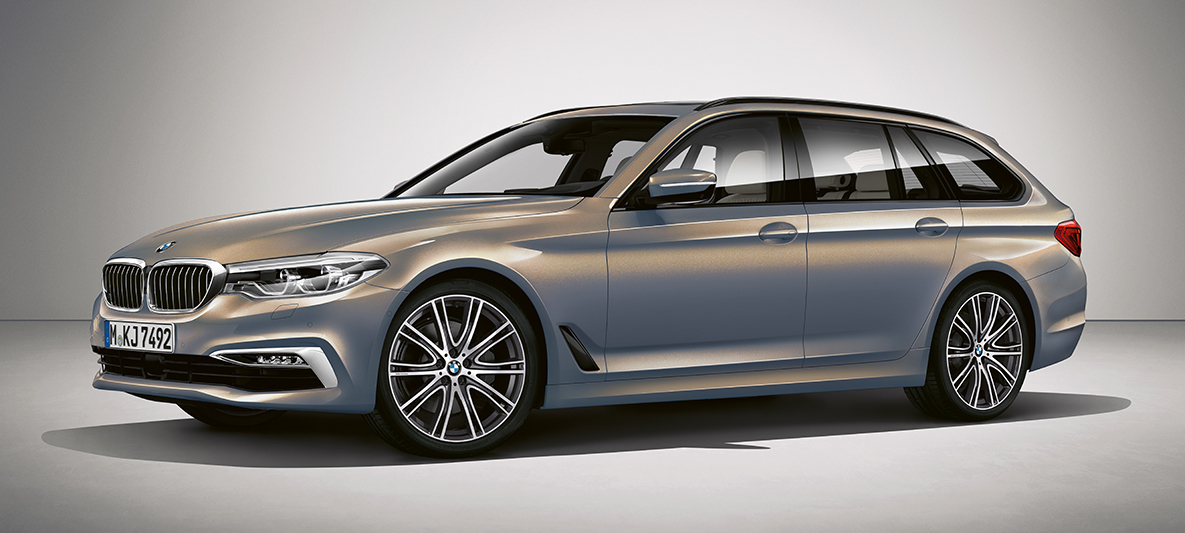 BMW Individual BMW 5-serie Touring BMW Individual BMW 5-serie Touring G31 Champagner Quarz metallic trefjärdedelsvy från sidan