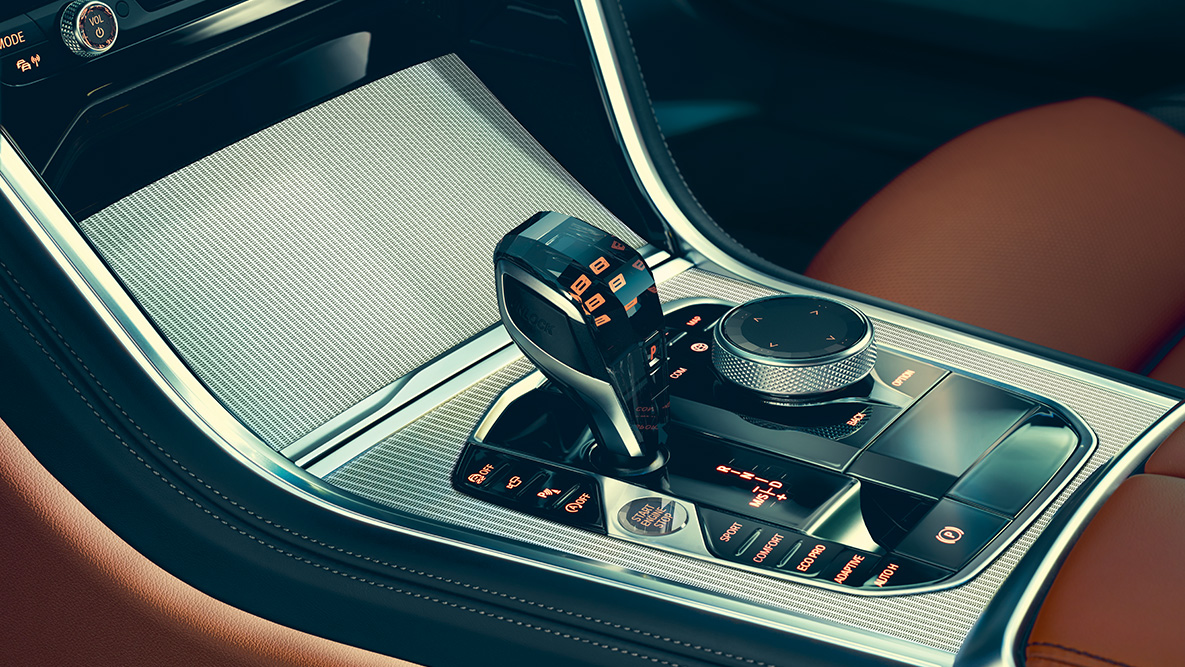 BMW 8-serie Coupé, glasinlägg. Närbild på BMW 8-serie Coupé glasinlägg i kupén.