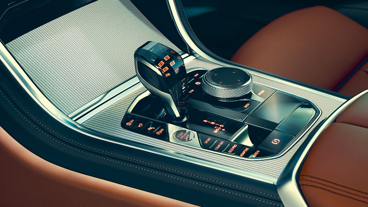 BMW 8-serie Coupé, mittkonsol. Närbild på BMW 8-serie Coupé kupéutrymme med fokus på mittkonsolen.