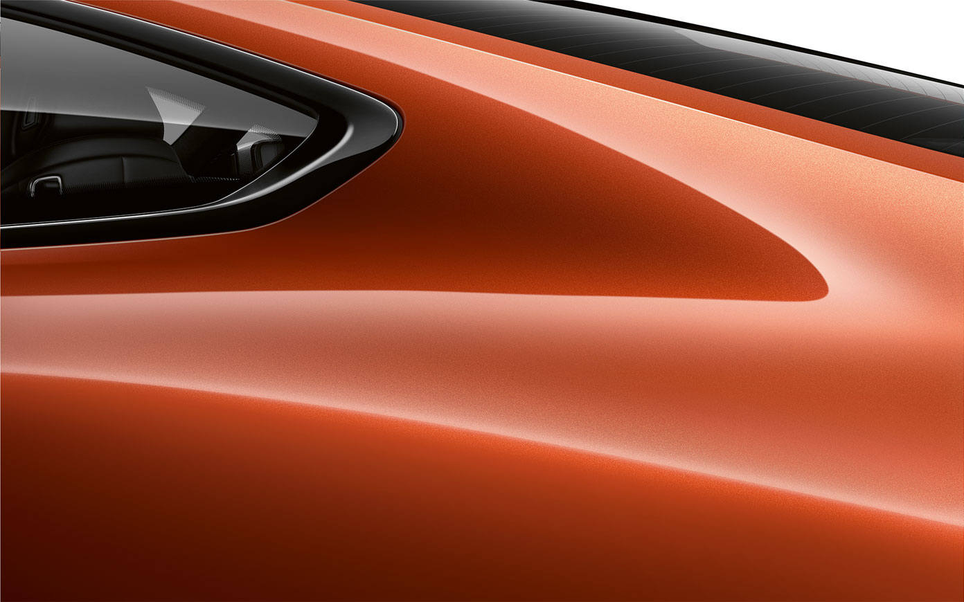 BMW 8-serie Coupé, närbild C-stolpe. Närbild på C-stolpen på BMW 8-serie Coupé i Sunset Orange metallic.