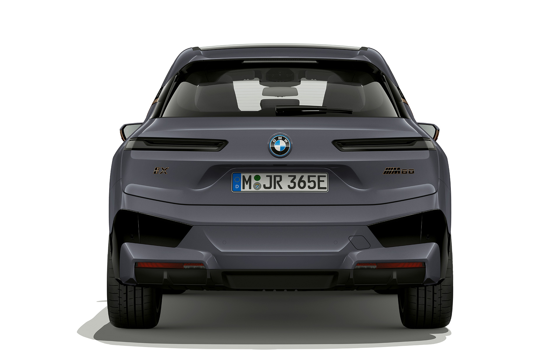 BMW iX M60 i20 2022 eldriven SUV elbil Oxidgrå metallic sedd bakifrån med M lyktor Shadow Line