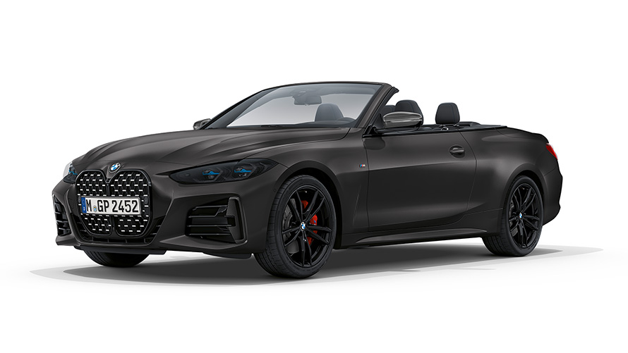 BMW M440i xDrive Cabriolet G23 2020 BMW Individual Frozen Deep Grey metallic sedd snett framifrån med öppen tygsufflett