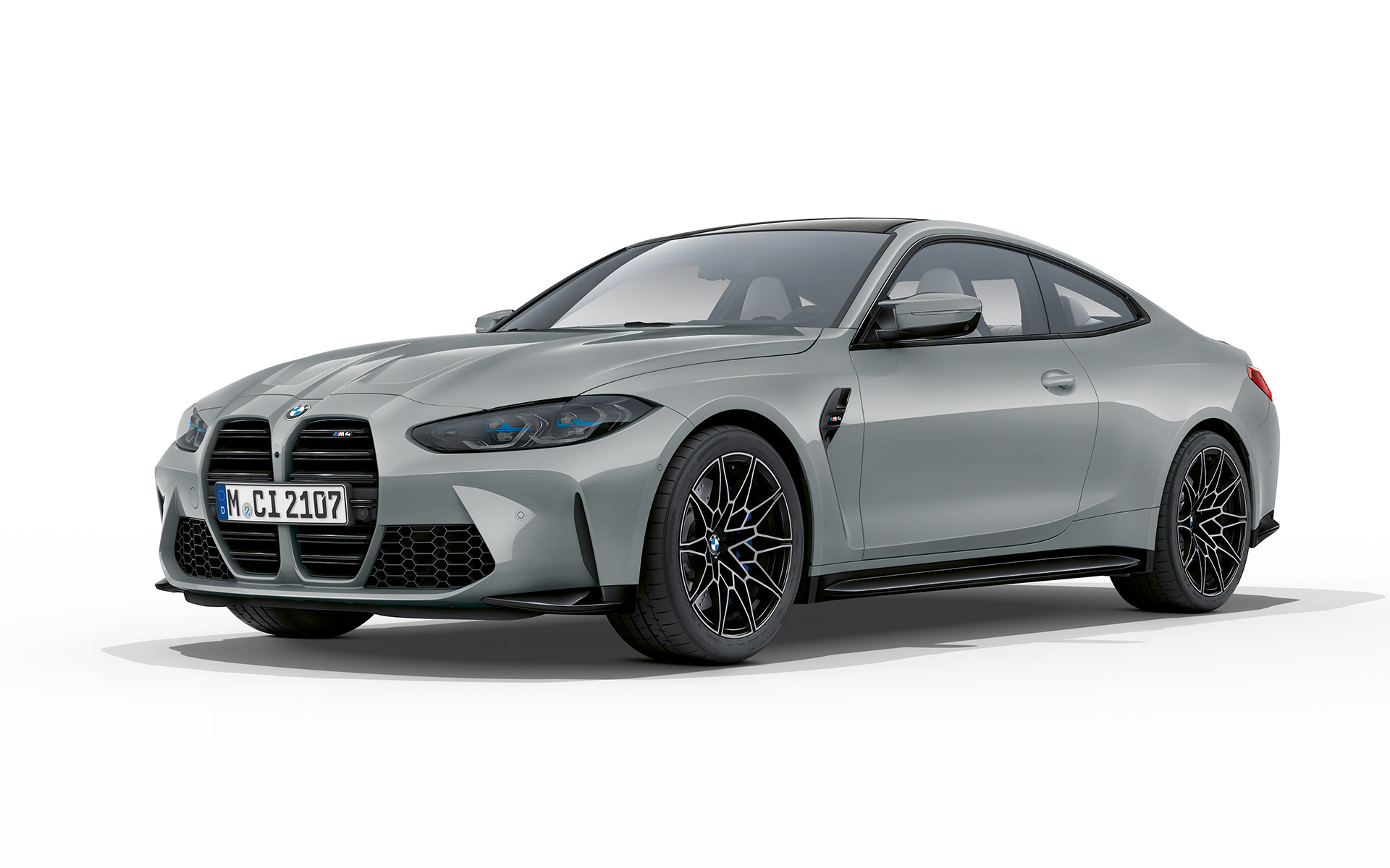 BMW M4 Coupé G82 2020 Brooklyn Gråmetallic sedd snett framifrån