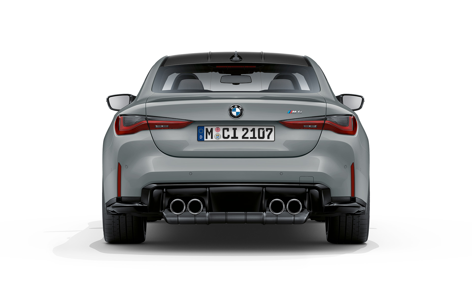 BMW M4 Coupé G82 2020 Brooklyn Gråmetallic sedd bakifrån