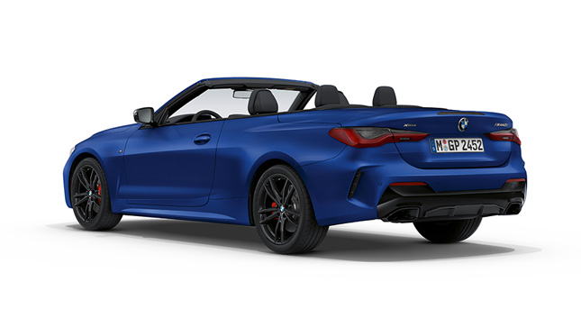 BMW M440i xDrive Cabriolet G23 2020 BMW Individual Frozen Portimao Blå metallic sedd snett bakifrån 