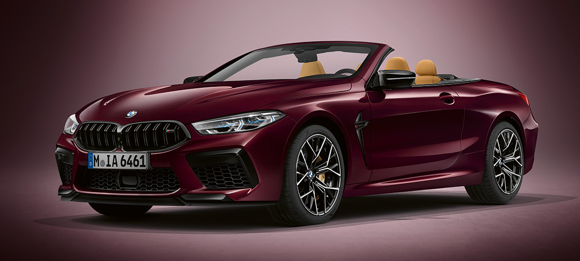 BMW Individual M8 Cabriolet i BMW Individual Ametrine metallic. BMW Individual M8 Cabriolet i BMW Individual Ametrine metallic, trefjärdedelsvy framifrån.