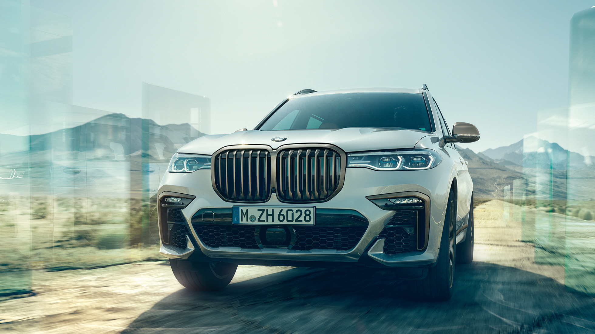 BMW X7 M50d, sedd framifrån BMW X7 M50d i Mineralvit, sedd framifrån, G07, 2019