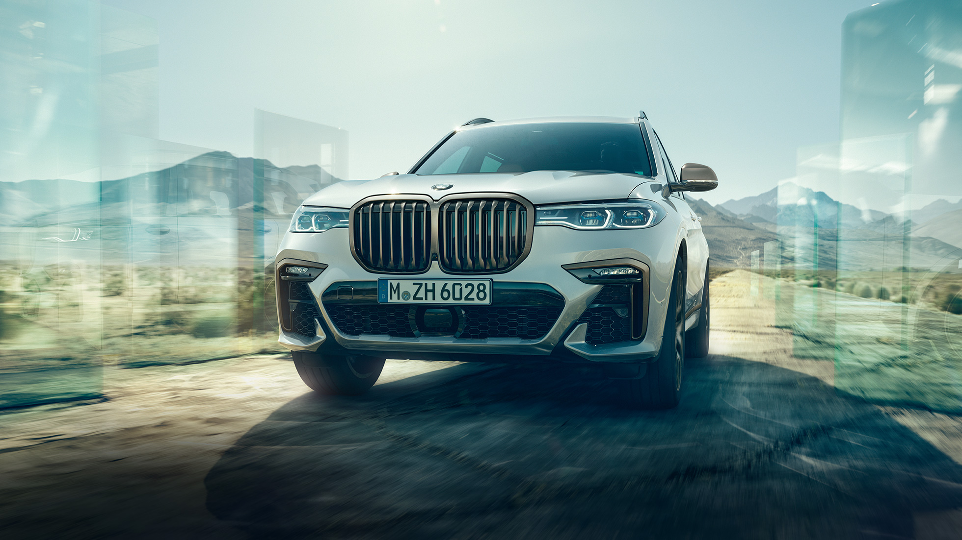 BMW X7 M50d, sedd framifrån BMW X7 M50d i Mineralvit, sedd framifrån, G07, 2019