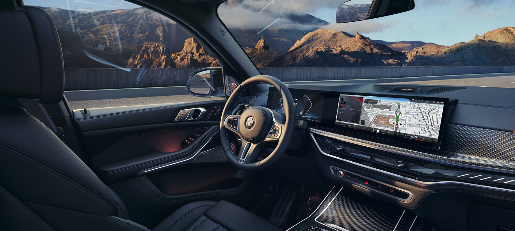 BMW X7 M60i G07 LCI förarplats invändig utrustning BMW X7 M60i G07 LCI förarplats invändig utrustning framför bergslandskap