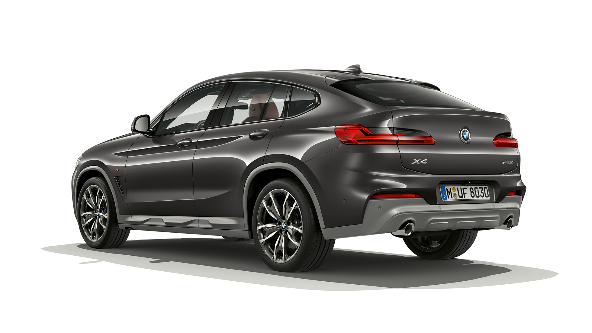 Trefjärdedelsvy bakifrån BMW X4 Modell M Sport X BMW X4 xDrive30i Modell M Sport x G02 2018 Sophistogrå briljanteffekt trefjärdedelsvy bakifrån