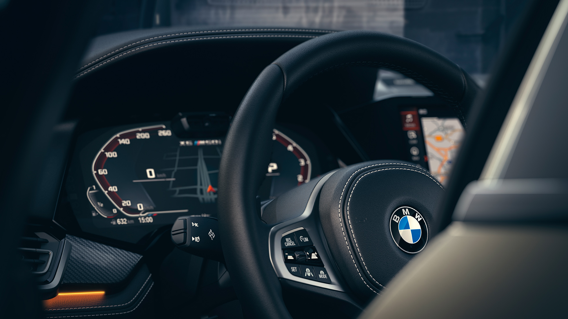 BMW-assistanssystem. Närbild på BMW-interiör med fokus på kombiinstrument.