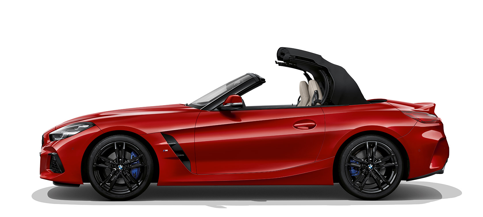 BMW Z4 Roadster från sidan BMW Z4 Roadster sedd från sidan, suffletten håller på att öppnas