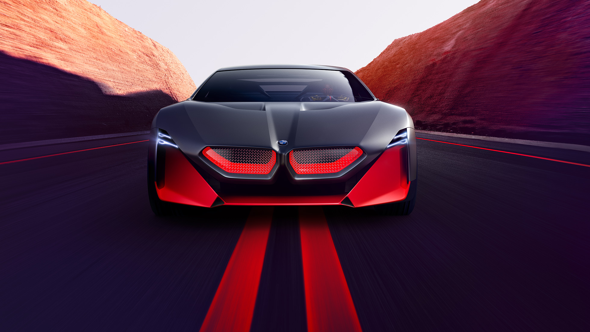 BMW Vision M NEXT, sedd framifrån BMW Vision M NEXT, sedd framifrån, körandes